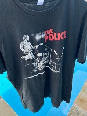 Police Black Short-Sleeve Graphic Tee with Red Logo